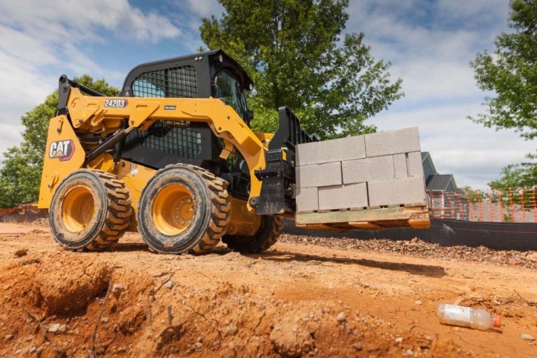 Harnessing Nature’s Power: The Red Barn Guy’s Guide to Skid Steer Attachments for Eco-Friendly Land Management